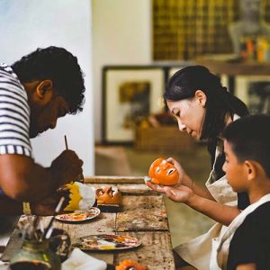 The Artisan's Canvas: Traditional Mask Painting